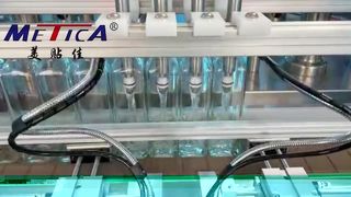 Glazen fles vloeistofvulmachine